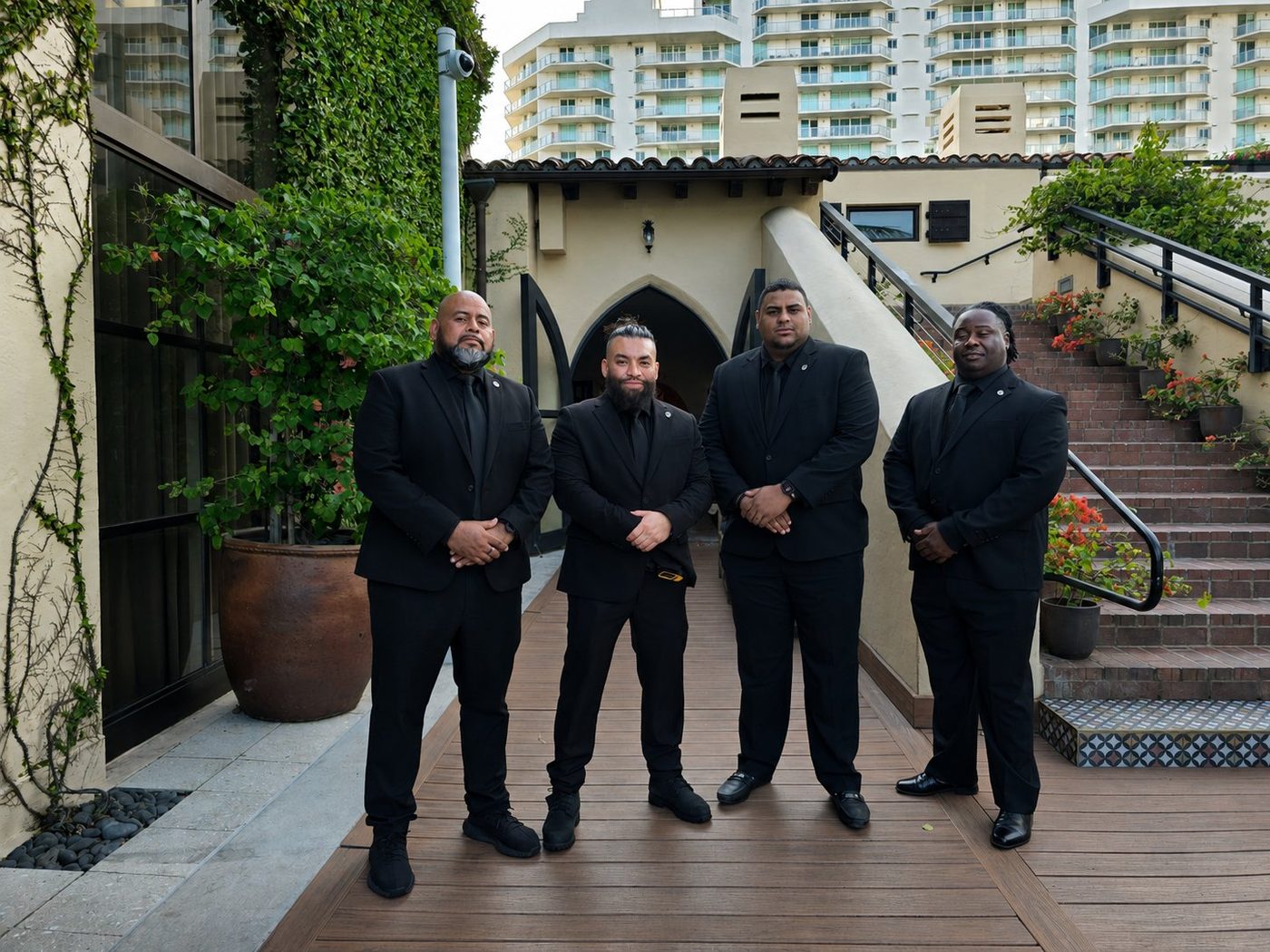 ISI executive protection detail in suits at a luxury Miami hotel